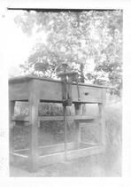 SA0657 - Photo of a vise on a work table., Winterthur Shaker Photograph and Post Card Collection 1851 to 1921c